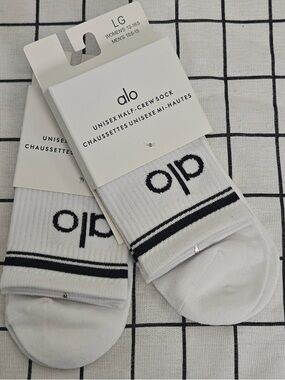 ALO Yoga White Crew Socks with Black Logo and Stripes